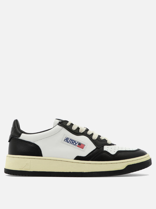Sneaker basse 100% cow leather - 100% rubber  Nero - Autry Uomo | PLP | VIETTI Online Store 
