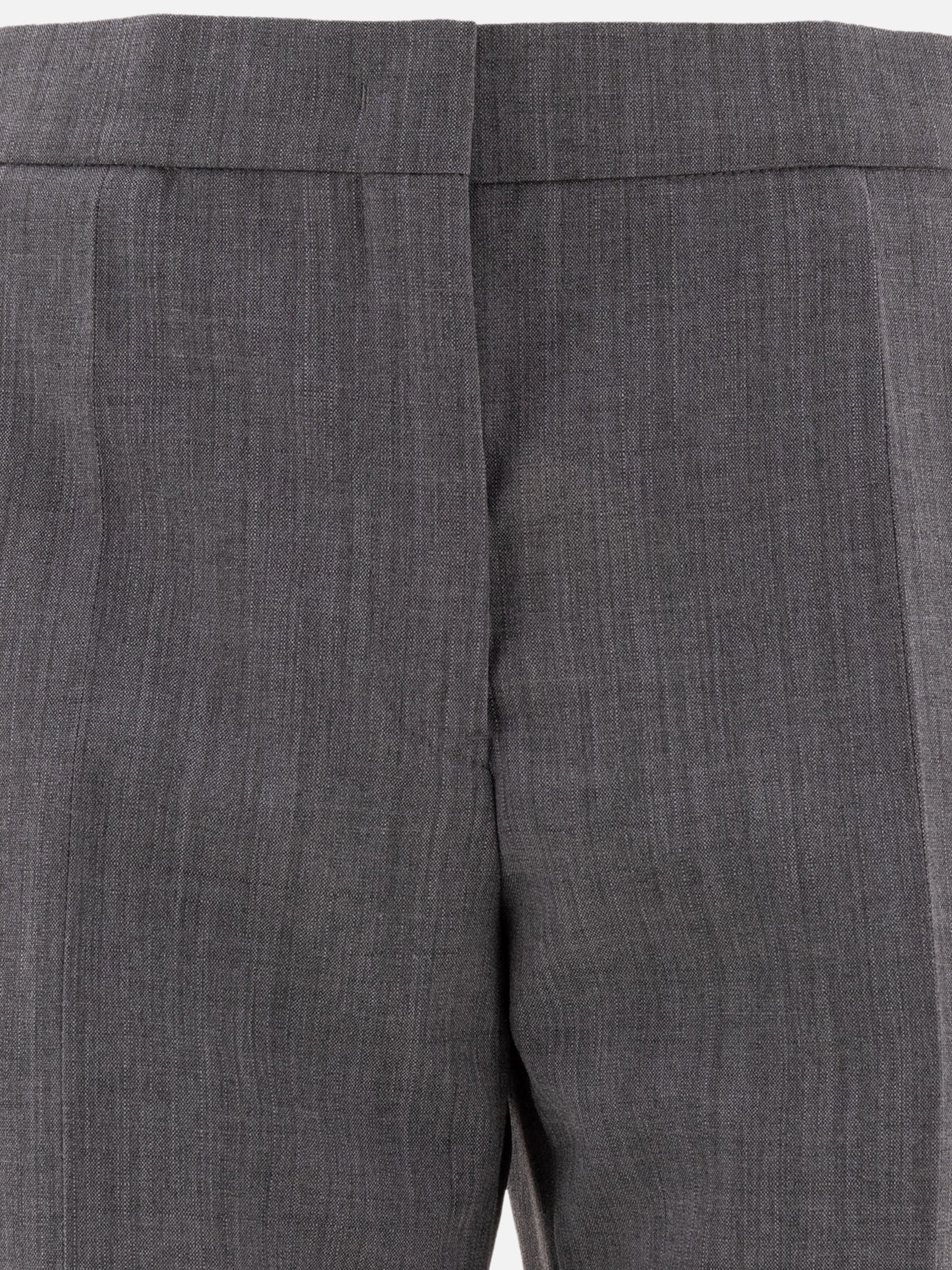 Tailored trousers with centre-back slit